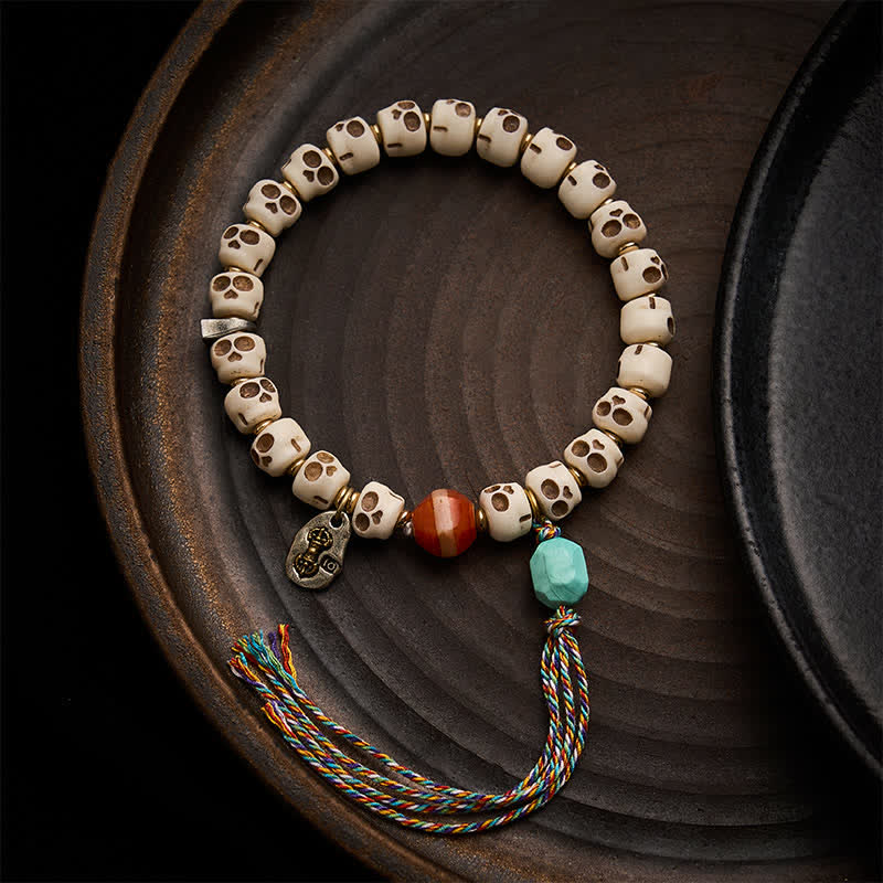 Buddha Stones Bracelet d'ancrage en perles d'os tibétaines, motif crâne du Seigneur de la Forêt des Cadavres - 9 × 6,3 mm - image 0