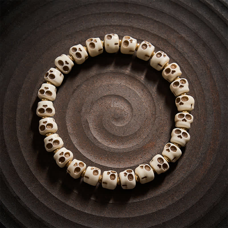 Buddha Stones Bracelet en perles d'os tibétaines, motif crâne du Seigneur de la Forêt des Cadavres, symbole de protection et de courage - image 1
