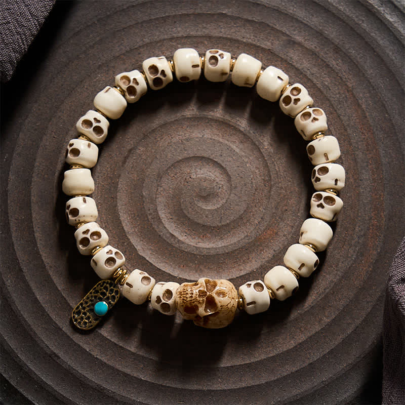 Buddha Stones Bracelet tibétain en perles d'os sculptées à la main, motif crâne du Seigneur de la Forêt des Cadavres, symbole de force et de changement - image 1