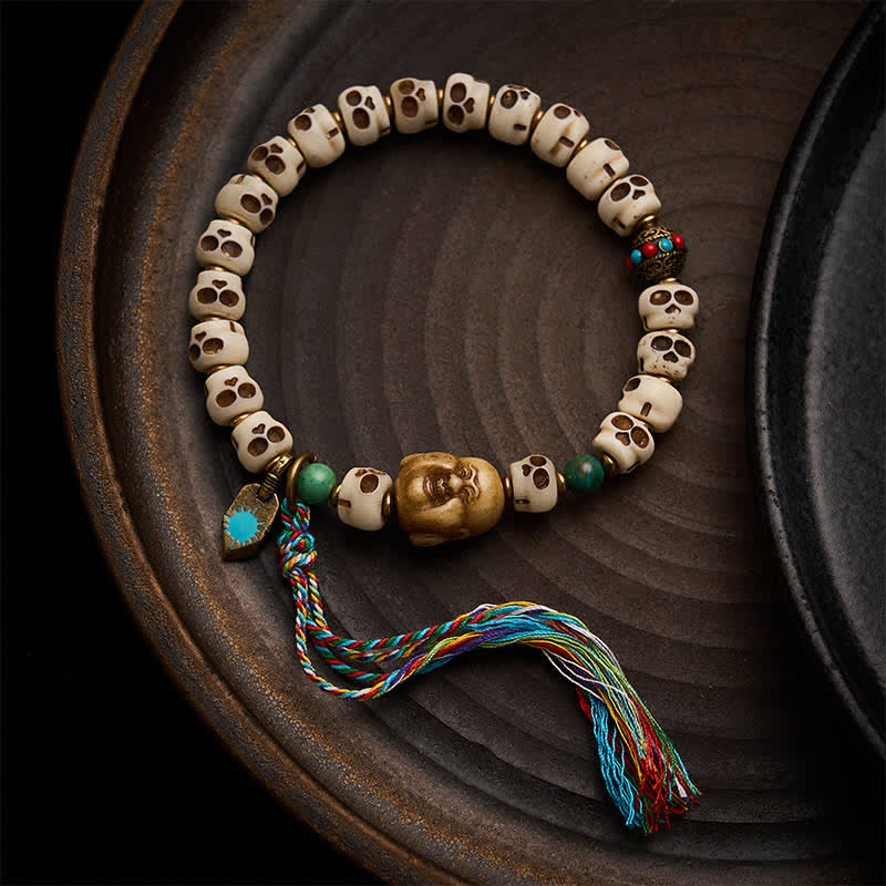 Buddha Stones Bracelet en perles d'os tibétaines, motif crâne du Seigneur de la Forêt des Cadavres, symbole de force et de changement - 9 × 6,3 mm - image 0