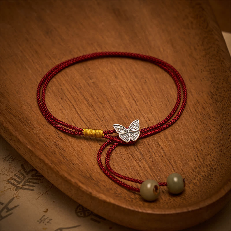Buddha Stones Bracelet vintage en argent sterling 925 avec papillon et cordon rouge tressé, symbole de protection. - image 1