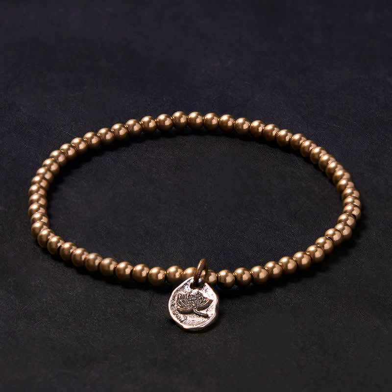 Buddha Stones Bracelet de guérison en perles de cuivre et breloque lotus - image 1