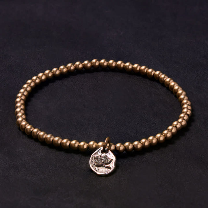 Buddha Stones Bracelet de guérison en perles de cuivre et breloque lotus - image 1