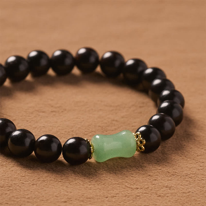 Buddha Stones Bracelet unisexe en bois d'ébène, bois de santal vert et grain naturel - image 4