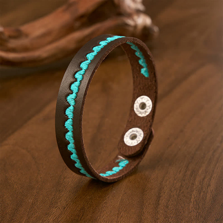 Buddha Stones Bracelet de protection ajustable en cuir brodé d'un cœur et d'une boucle. - Bleu (Tour de poignet : env. 17–19 cm) - image 0