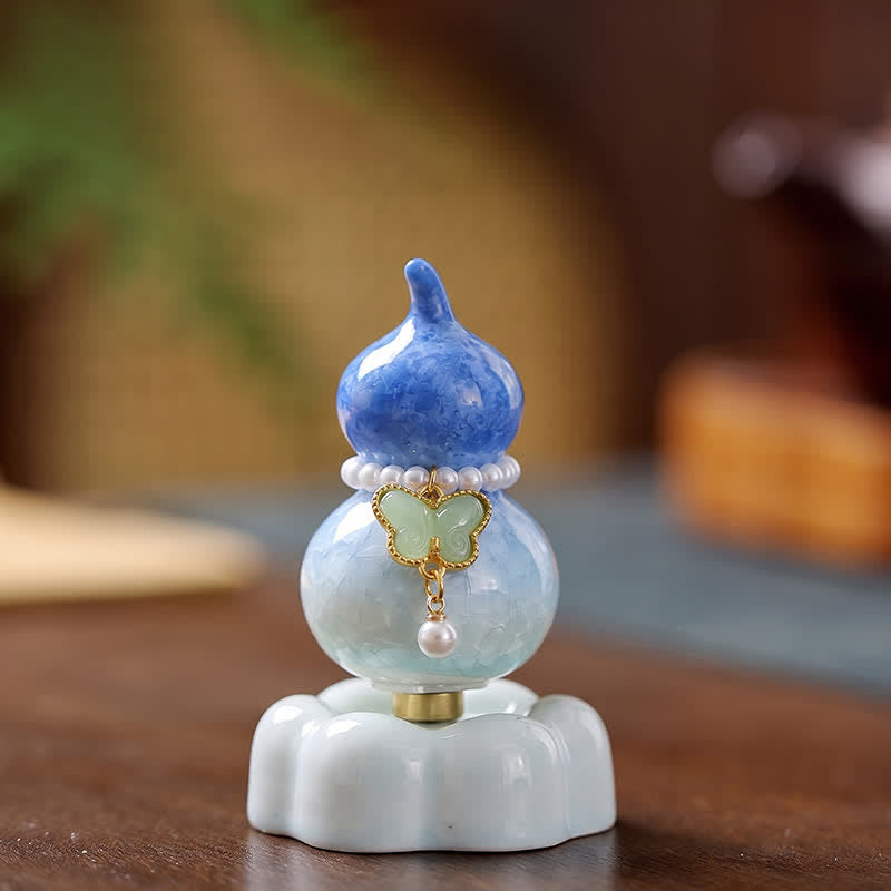 Buddha Stones Gourde papillon en céramique rotative, décoration pour une vie consciente - Gourde bleu foncé + papillon vert clair + base bleue - image 0