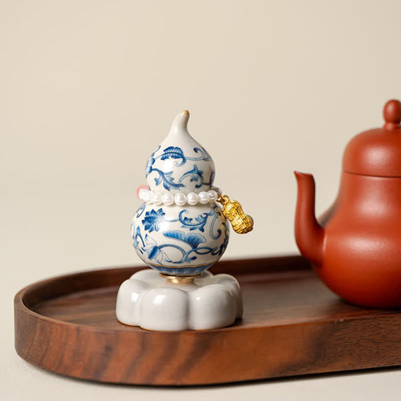 Buddha Stones Gourde rotative en céramique bleue et blanche en forme de lotus, décoration pour un mode de vie conscient - image 1