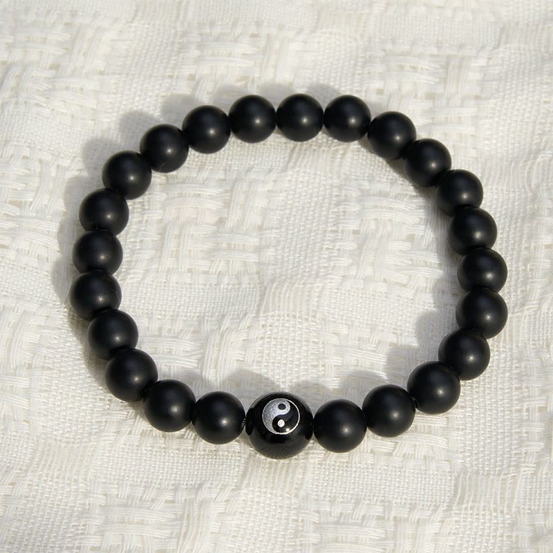 Buddha Stones Bracelet Yin Yang en perles rondes d'onyx noir, turquoise blanche et obsidienne noire. - image 1