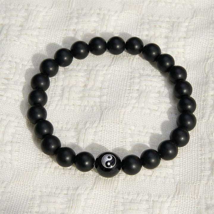 Buddha Stones Bracelet Yin Yang en perles rondes d'onyx noir, turquoise blanche et obsidienne noire. - image 1