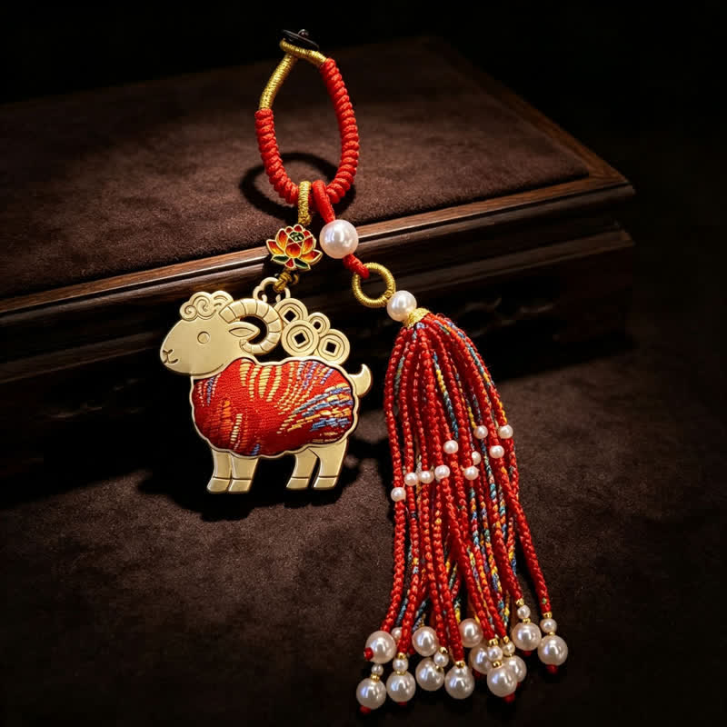 Buddha Stones Porte-clés pureté en brocart Song, lotus, chèvre, perle et pompon - Rouge - image 0