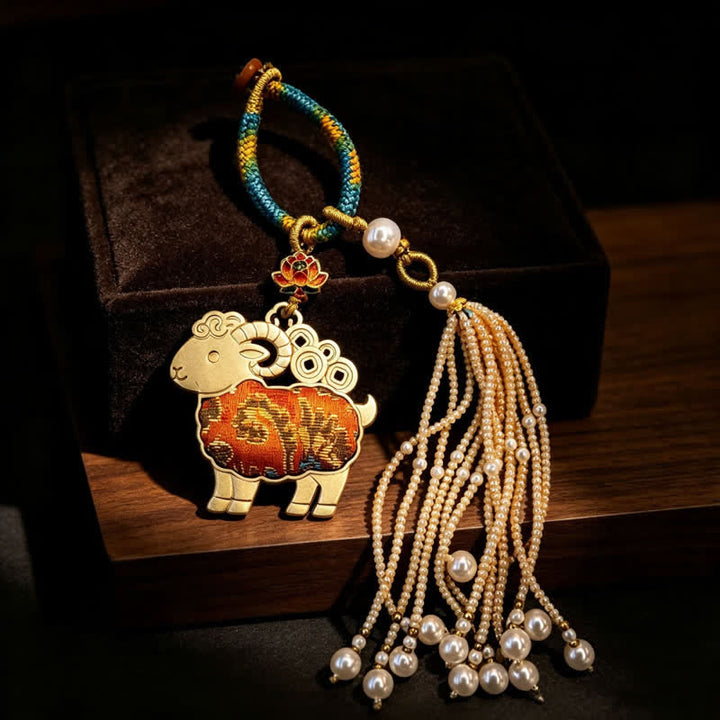 Buddha Stones Porte-clés pureté en brocart Song, lotus, chèvre, perle et pompon - Orange - image 8