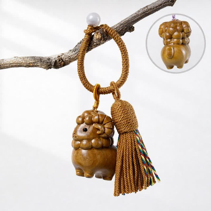 Buddha Stones Porte-clés à pompon en bois de santal vert sculpté à la main, motif chèvre arc-en-ciel et eucalyptus - Bois de santal vert - Brun - image 2