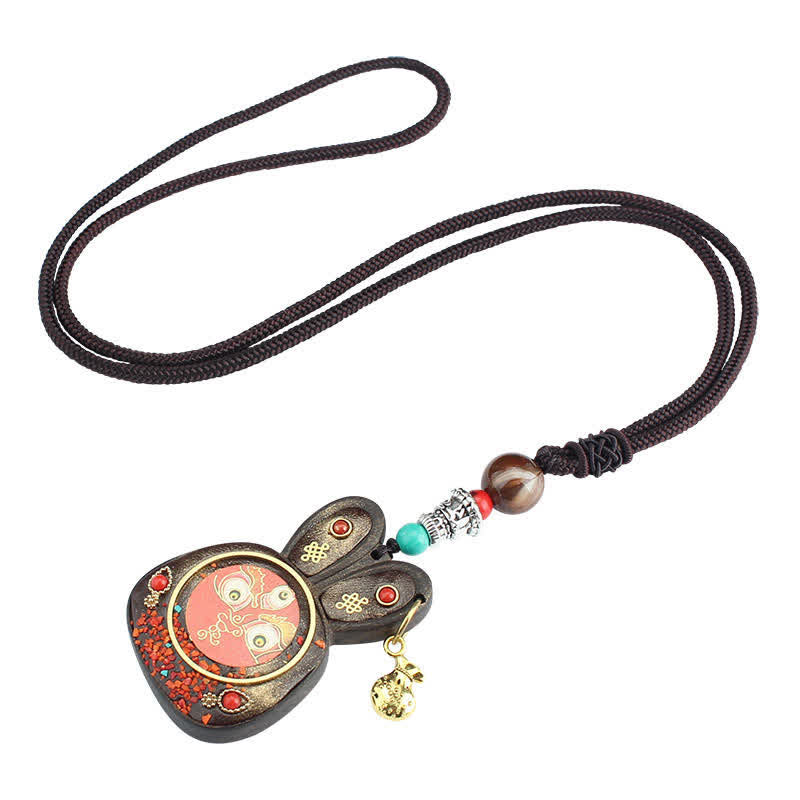 Collier pendentif Thangka en ébène du Tibet représentant les cinq dieux de la richesse