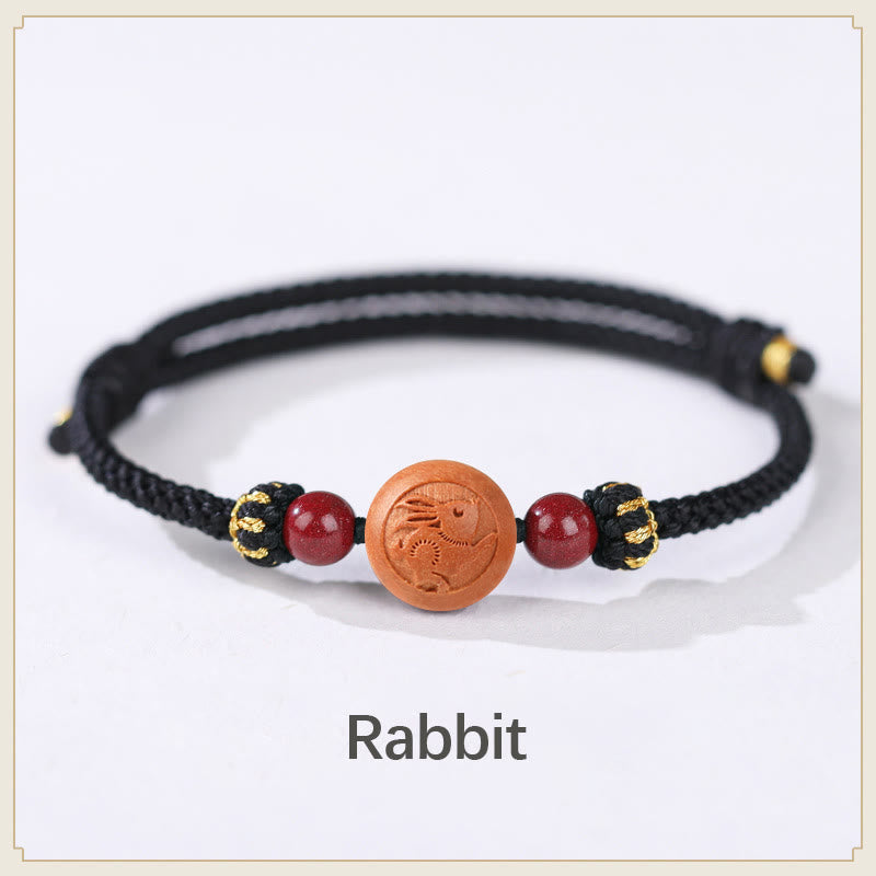 Bracelet de richesse en bois de pêche naturel Buddha Stones et caractère Fu du zodiaque chinois sculpté en cinabre