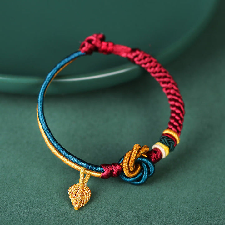 Bracelet tibétain en corde porte-bonheur fait main avec nœud mandala et Buddha Stones