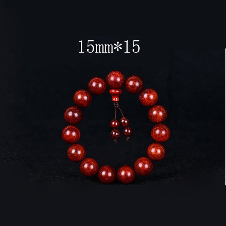 Bracelet d'équilibre tibétain en petites feuilles de santal rouge avec Buddha Stones