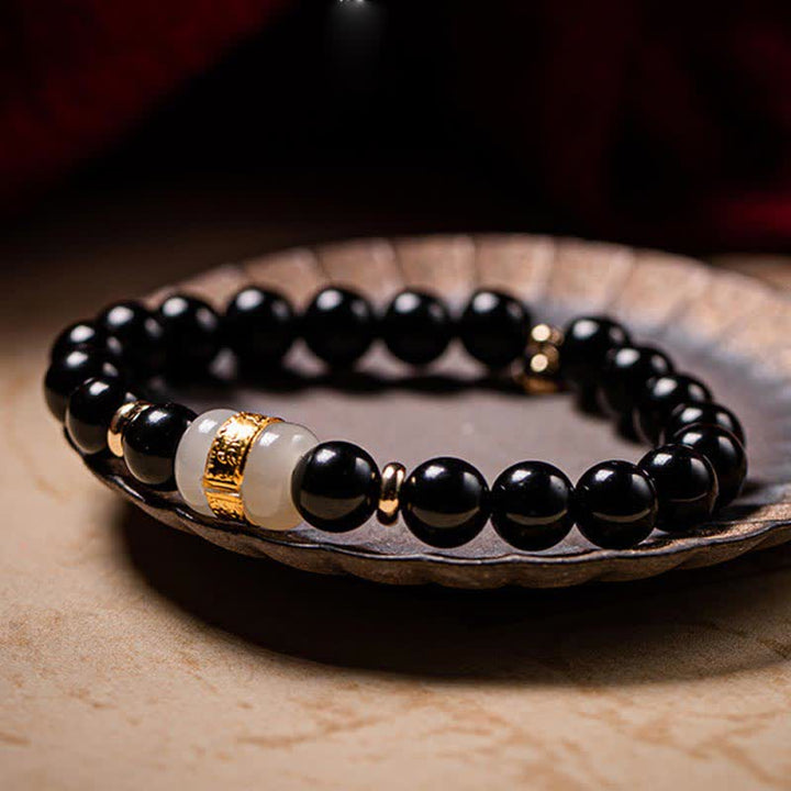 Bracelet magnétique pour couple en obsidienne Buddha Stones et jade Om Mani Padme Hum