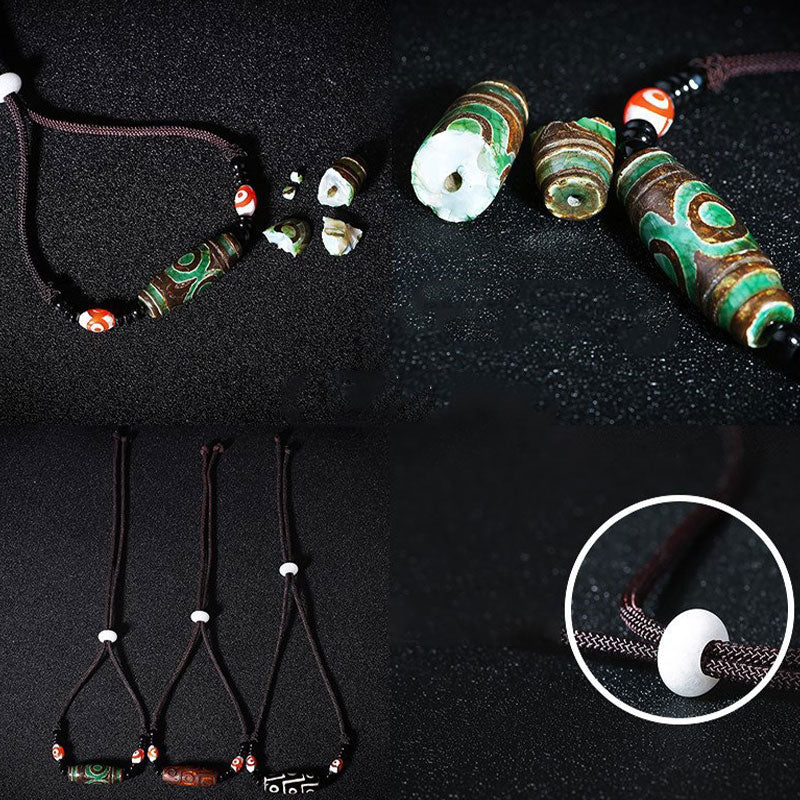 Collier de protection en perles tibétaines à neuf yeux Dzi Buddha Stones