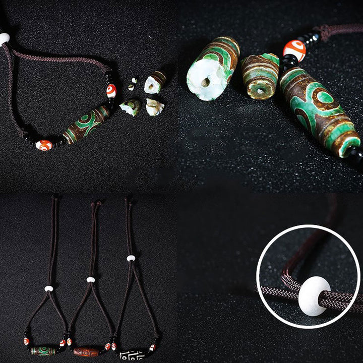 Collier de protection en perles tibétaines à neuf yeux Dzi Buddha Stones