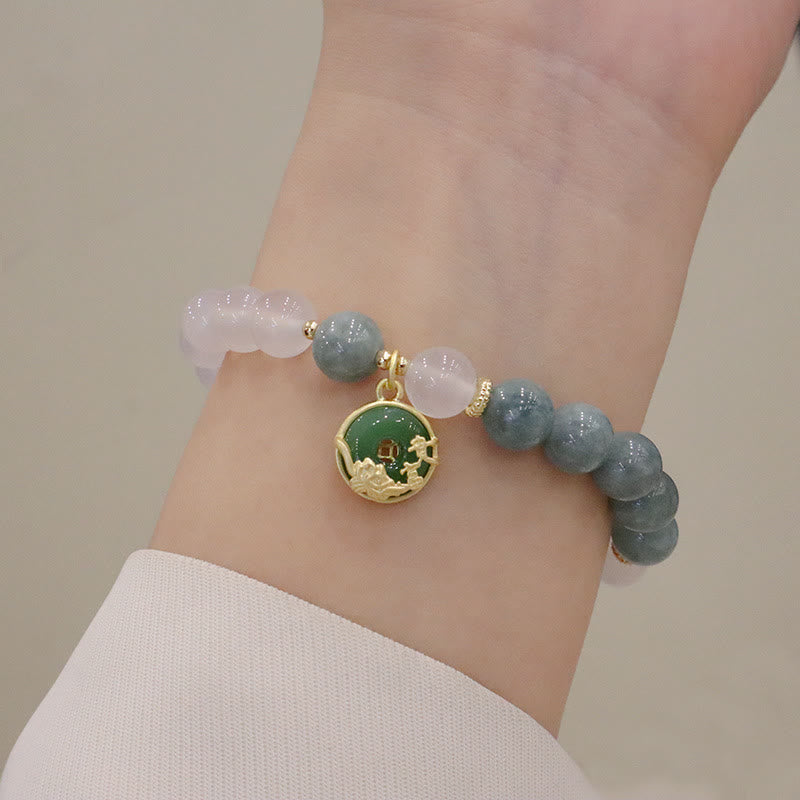 Bracelet de protection avec boucle de paix en Buddha Stones et jade blanc et fleur de lotus