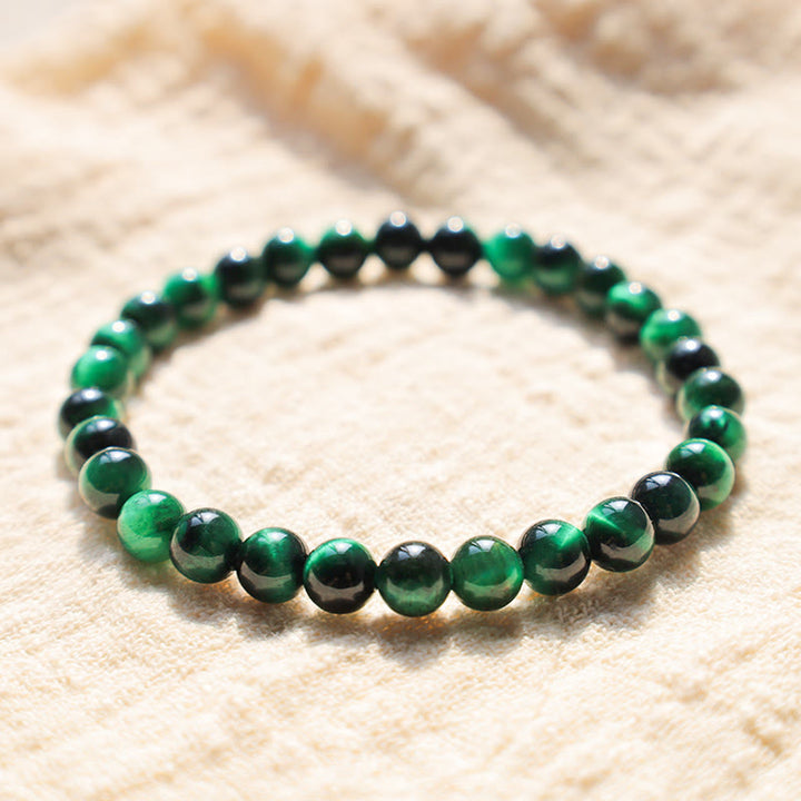 Bracelet énergétique de guérison et de croissance en œil de tigre Buddha Stones