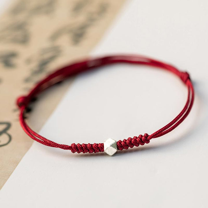 Bracelet en argent sterling 925 avec perle porte-bonheur et cordon fin tressé rouge, orné de Buddha Stones. - image 1