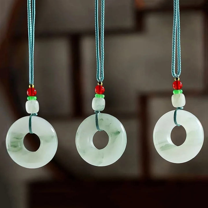 Collier pendentif en jade naturel avec boucle de paix et de prospérité en Buddha Stones