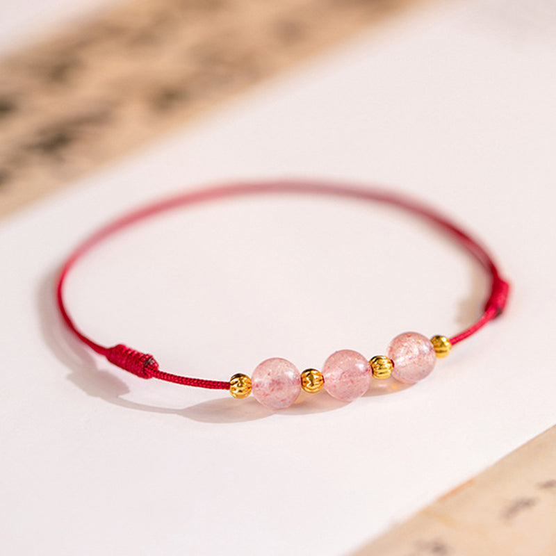 Bracelet de cheville en fil rouge avec perles en cristal de fraise et Buddha Stones