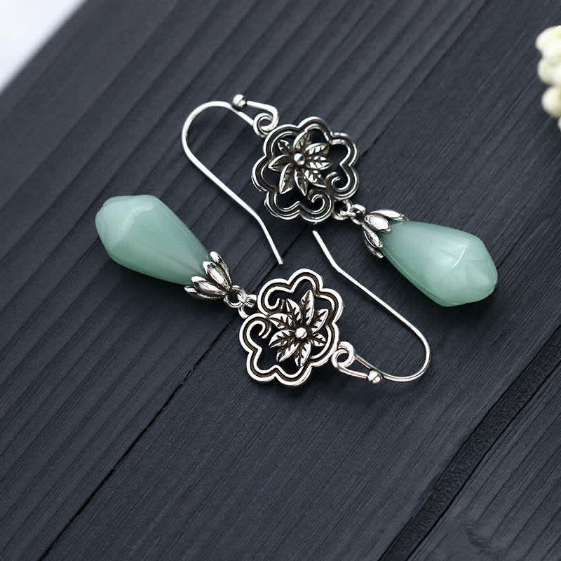 Boucles d'oreilles pendantes en jade et fleur de magnolia Buddha Stones