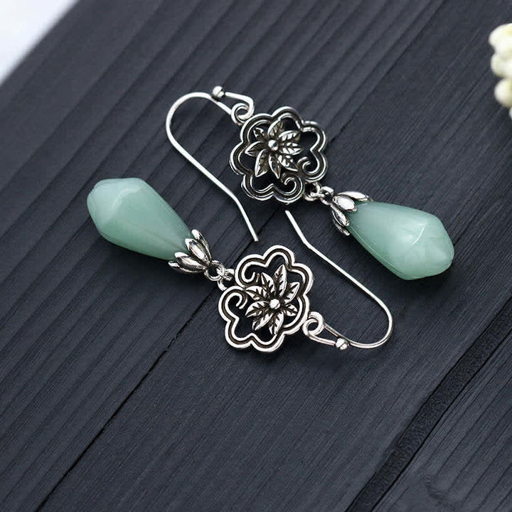 Boucles d'oreilles pendantes en jade et fleur de magnolia Buddha Stones