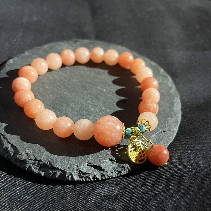 Bracelet porte-bonheur en Buddha Stones orange naturelle turquoise avec personnage Fu