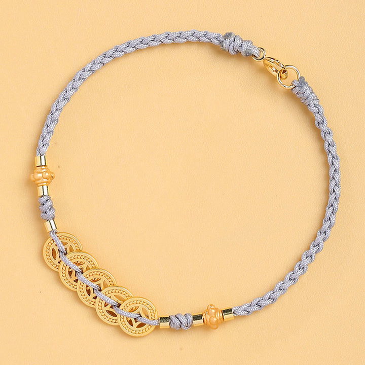 Bracelet tressé en corde bleue avec perles et arbre de fortune en cuivre et Buddha Stones