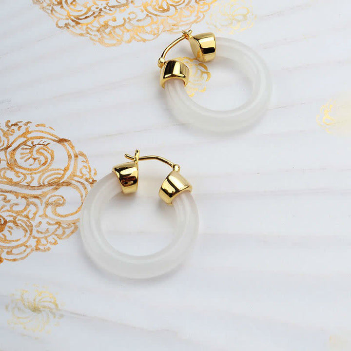 Boucles d'oreilles de prospérité en jade blanc et pierres de Buddha Stones