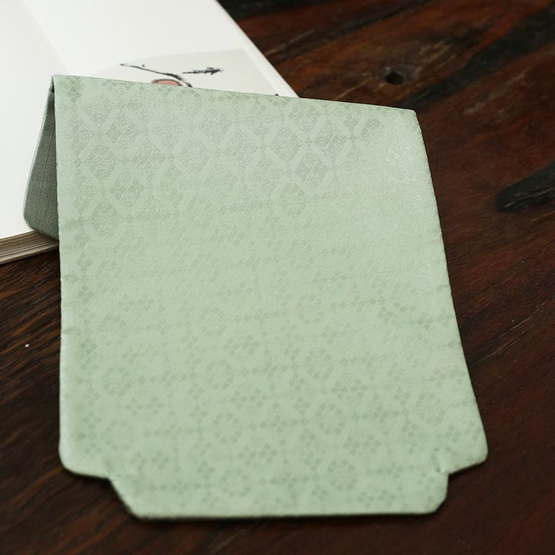 Dessous de verre élégant à motif de brocart floral pour tasse à thé