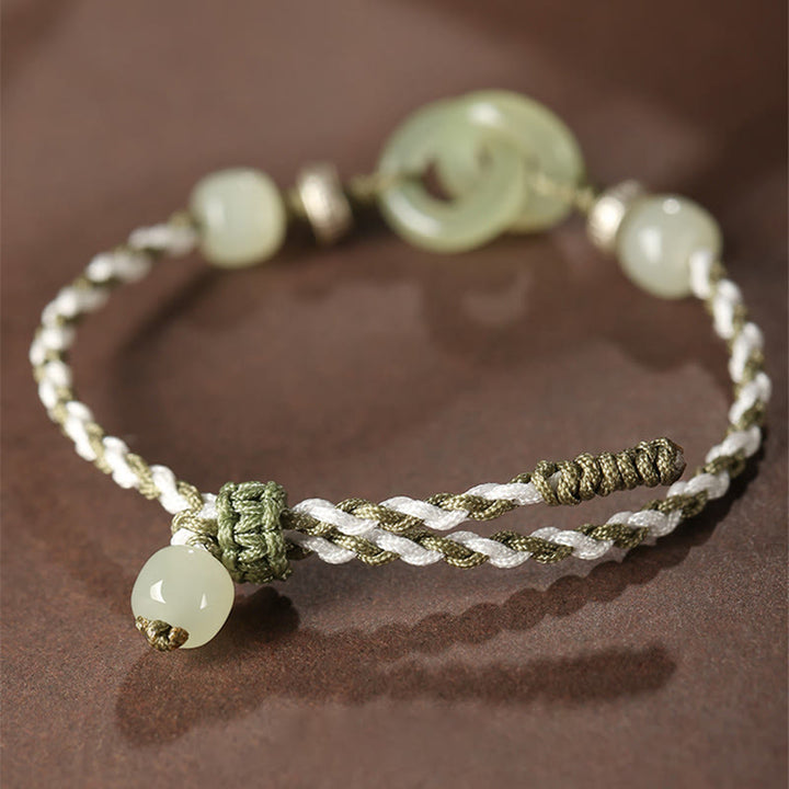 Bracelet tressé avec boucle de paix et porte-bonheur en jade naturel Hetian de Buddha Stones