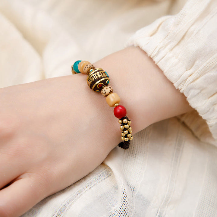 Bracelet de force de protection Om Mani Padme Hum en Buddha Stones tibétaines turquoise