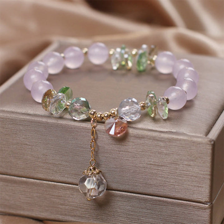 Bracelet à breloques en cristal rose œil de chat Buddha Stones - Calcédoine pourpre - image 9
