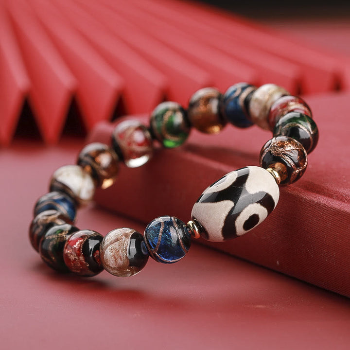 Buddha Stones Perle Dzi tibétaine à neuf yeux Perle Dzi à trois yeux Bracelet de richesse en perles de verre Liuli