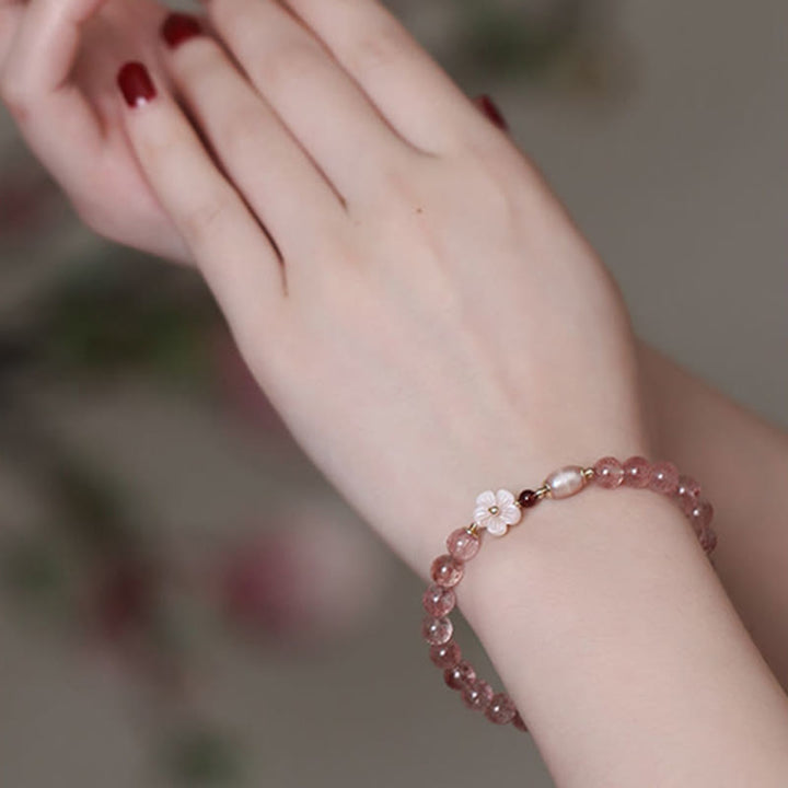 Bracelet d'amour en quartz fraise et fleur de pêcher Buddha Stones