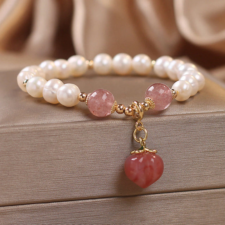 Bracelet à Buddha Stones en perles naturelles et quartz fraise, pêche, amour, cœur, sagesse