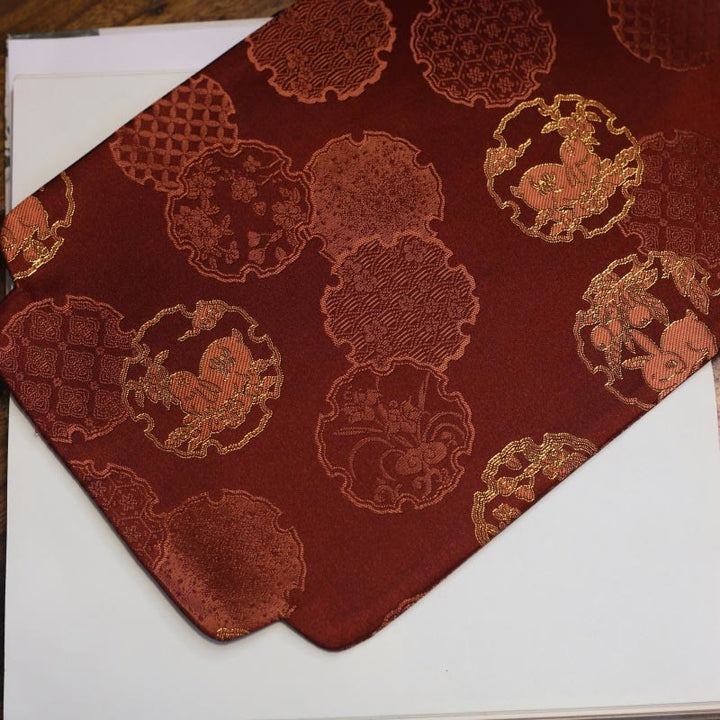 Dessous de verre élégant à motif de brocart floral pour tasse à thé