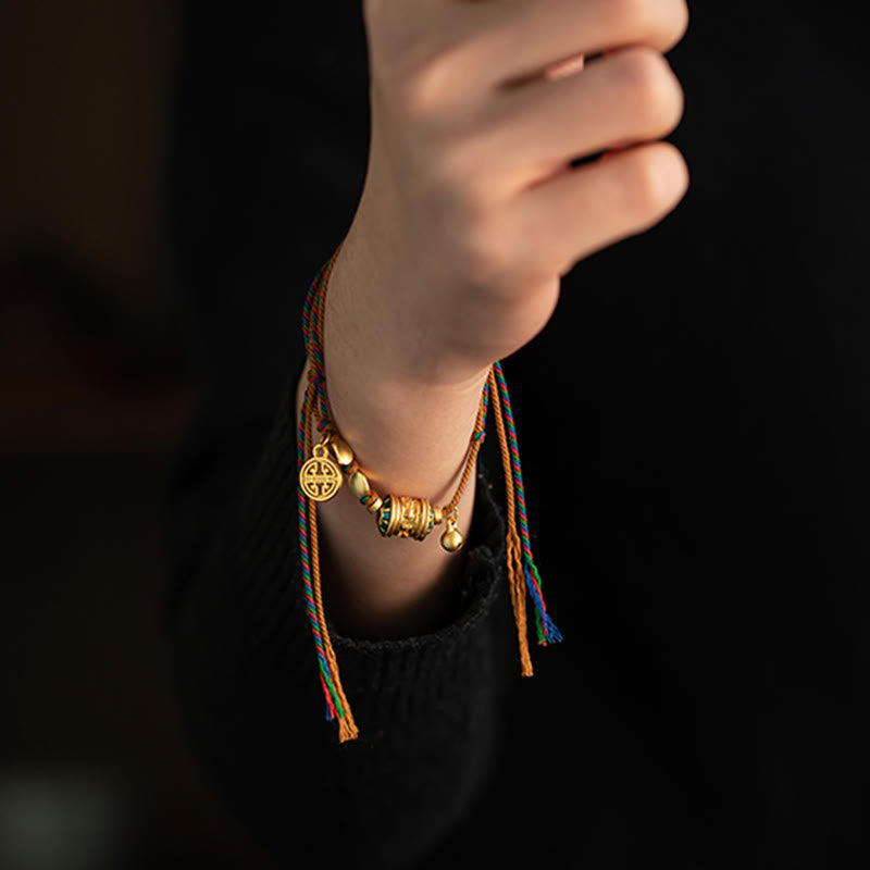 Bracelet tibétain en Buddha Stones fait à la main avec roue de prière Om Mani Padme Hum et cordon de protection