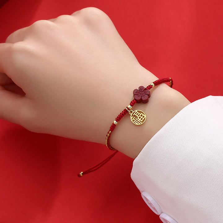 Bracelet tressé Buddha Stones et fleur de cinabre, bénédiction du personnage Fu