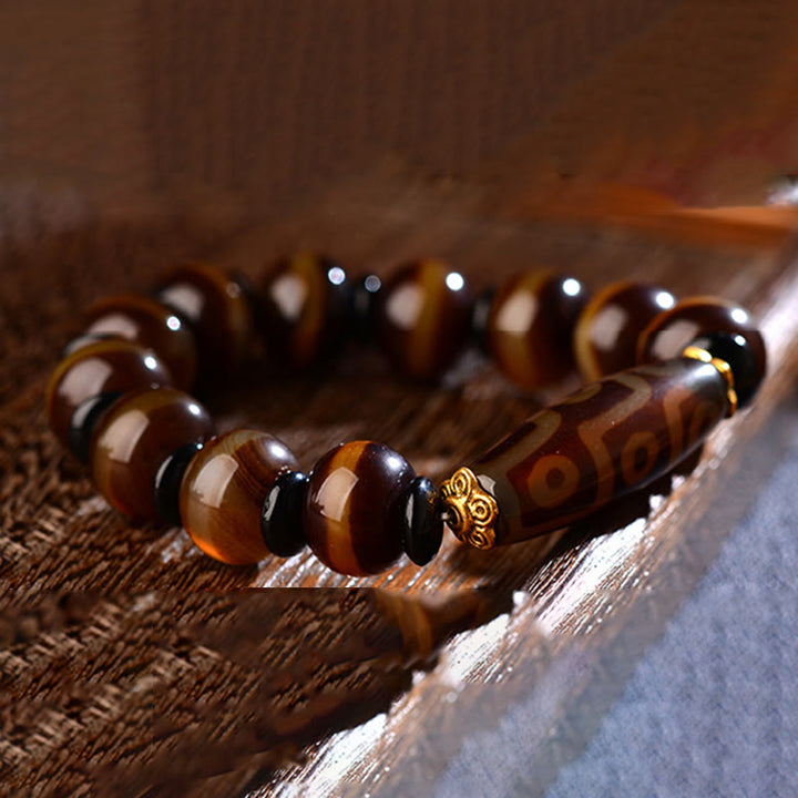 Bracelet tibétain en agate naturelle à neuf yeux avec perles dzi et Buddha Stones
