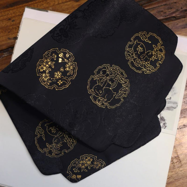 Dessous de verre élégant à motif de brocart floral pour tasse à thé