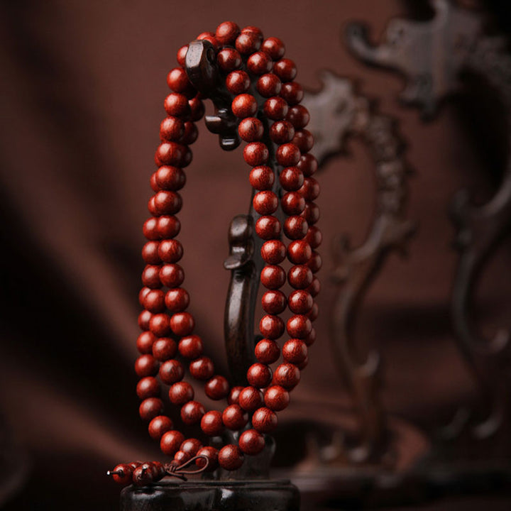 Bracelet de méditation Buddha Stones à petites feuilles en bois de santal rouge avec 108 perles