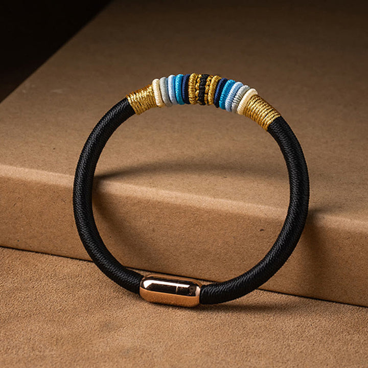 Bracelet tressé à boucle magnétique en Buddha Stones tibétaines fait à la main avec protection des nœuds King Kong