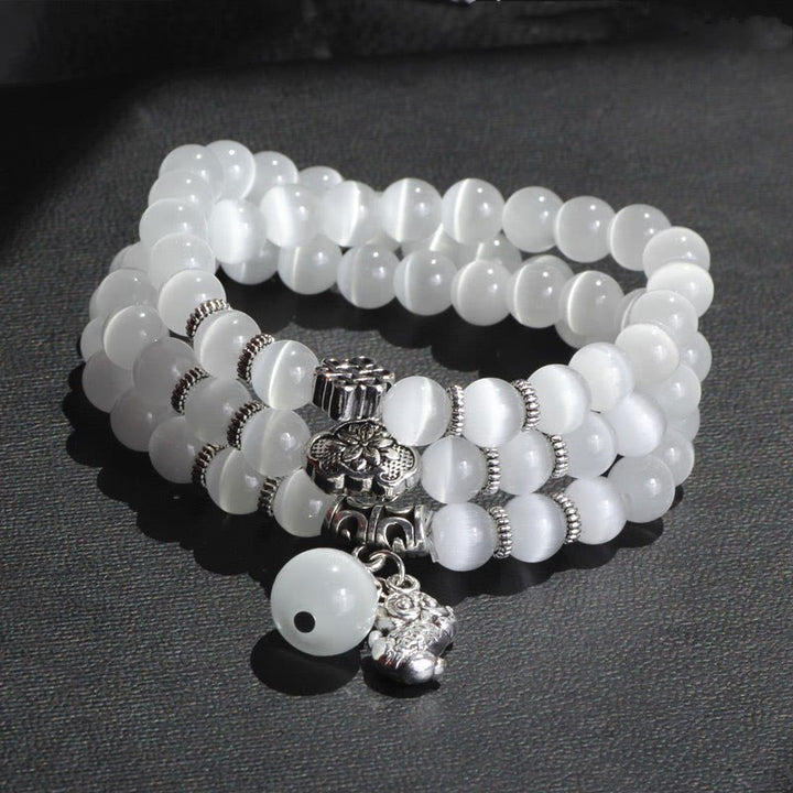 Bracelet triple tour de soutien PiXiu œil de chat en Buddha Stones