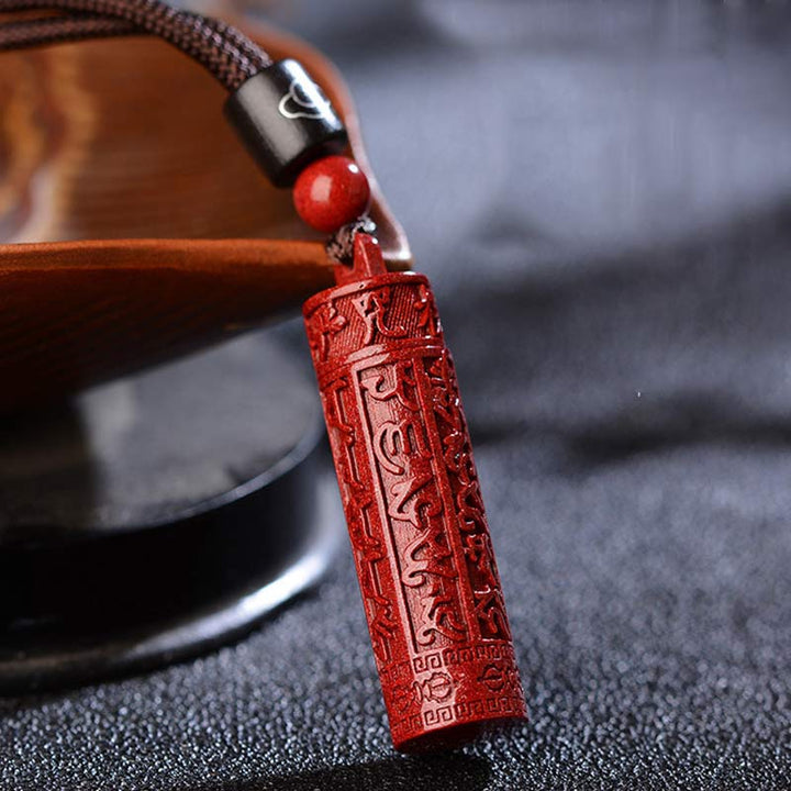 Collier de concentration de mantra tibétain en Buddha Stones en cinabre