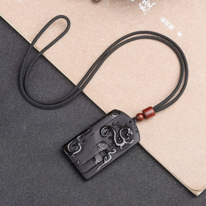 Collier avec pendentif dragon et phénix en obsidienne noire - image 5